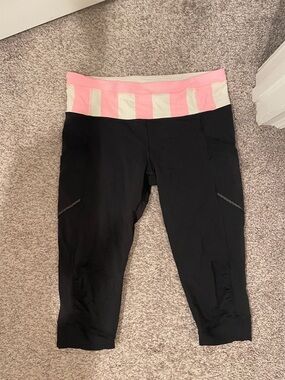 Lululemon Black Capri Leggings with Pink & Cream Stripe Waistband size 8